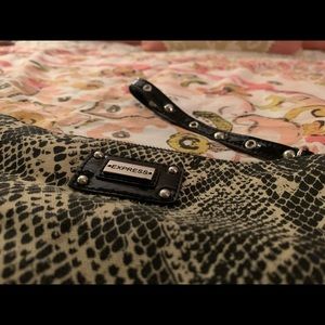 Small snake skin wristlet.